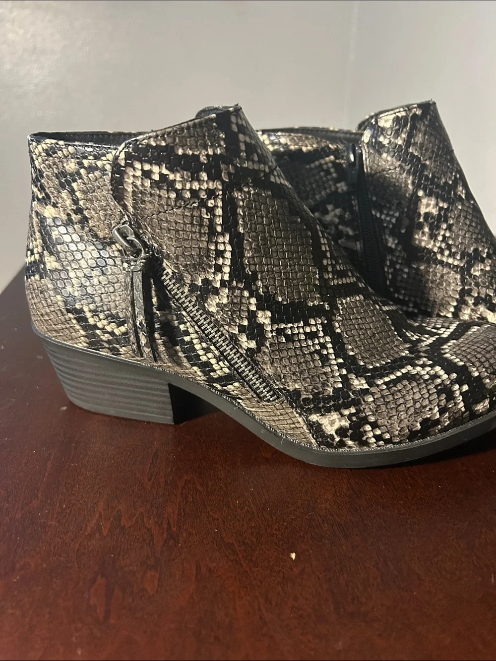 Arizona Jean Company Snake-Print Ankle Booties in Black and Cream